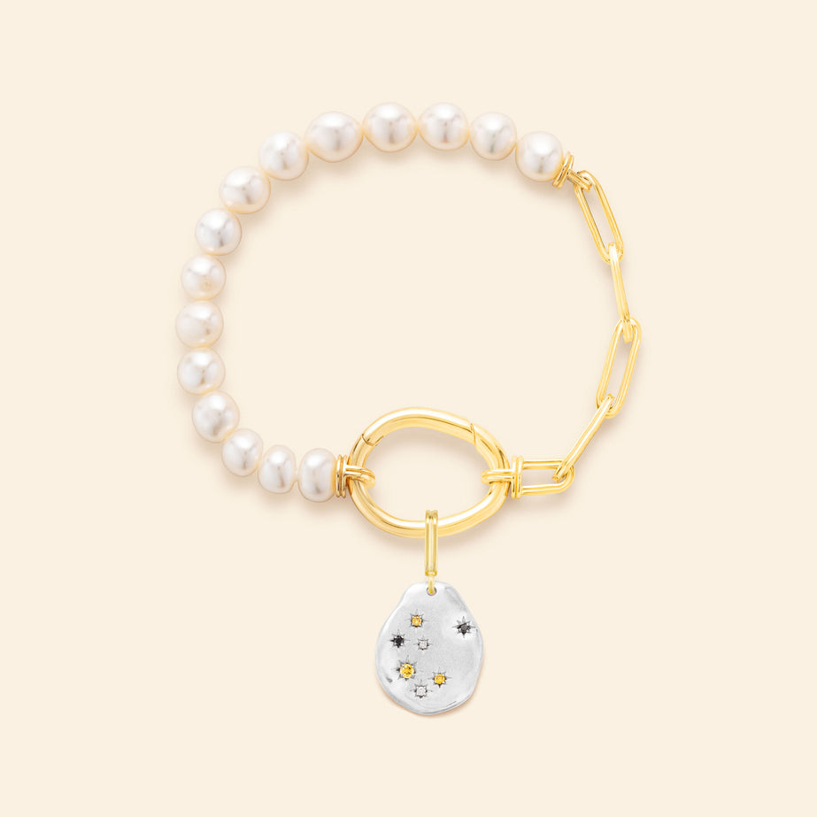 Médaille or gris Mellerio