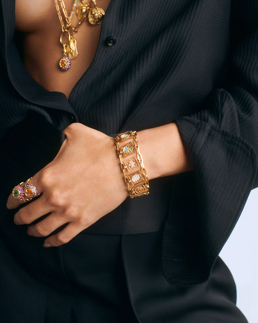 Bracelet en or jaune avec charms Mellerio