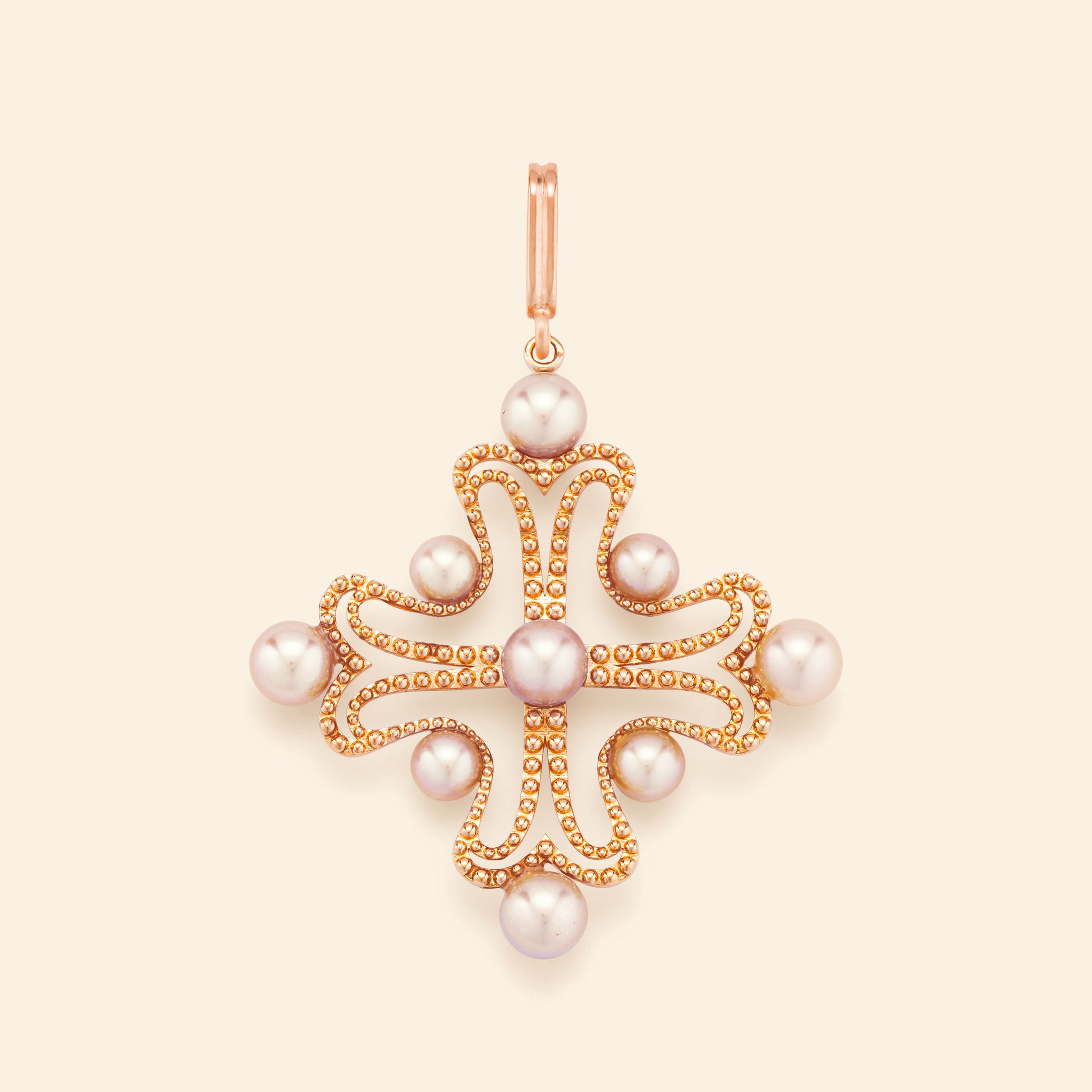 Médaille or rose Mellerio